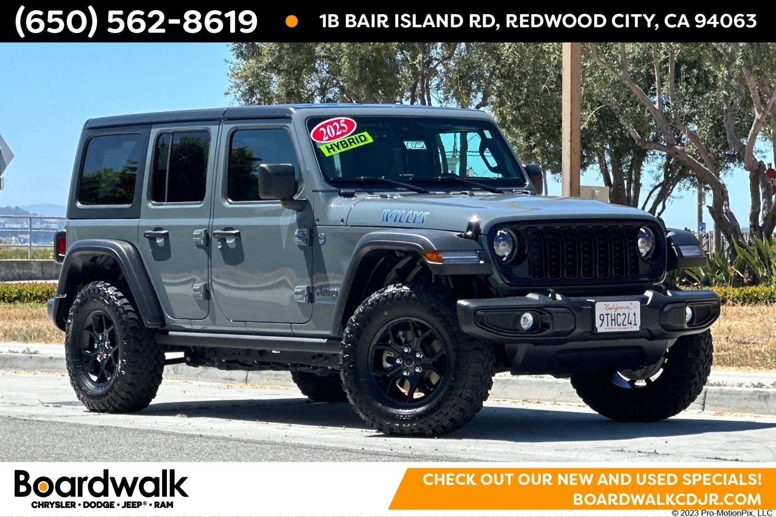 2025 Jeep Wrangler 4xe Willys 4xe in Anvil Clear Coat — front three-quarter view