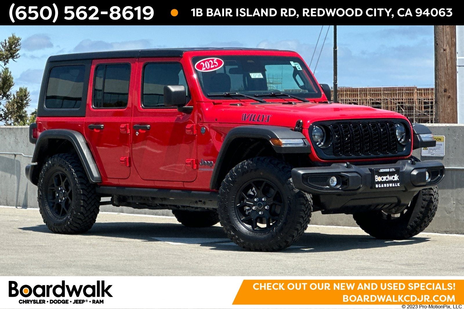 2025 Jeep Wrangler 4xe Willys 4xe in Firecracker Red Clearcoat — front three-quarter view