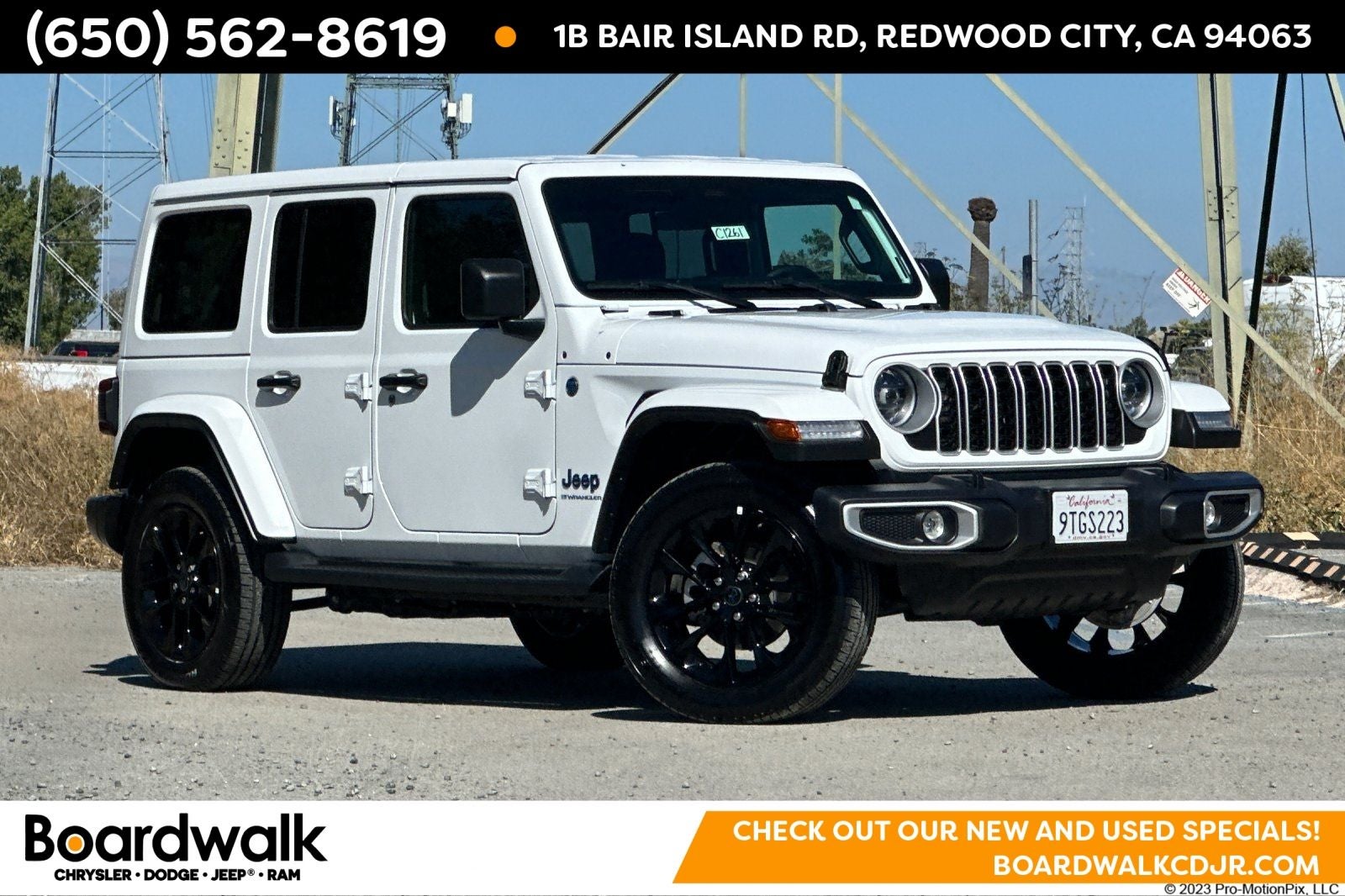 2025 Jeep Wrangler 4xe Sahara 4xe in Bright White Clearcoat — front three-quarter view