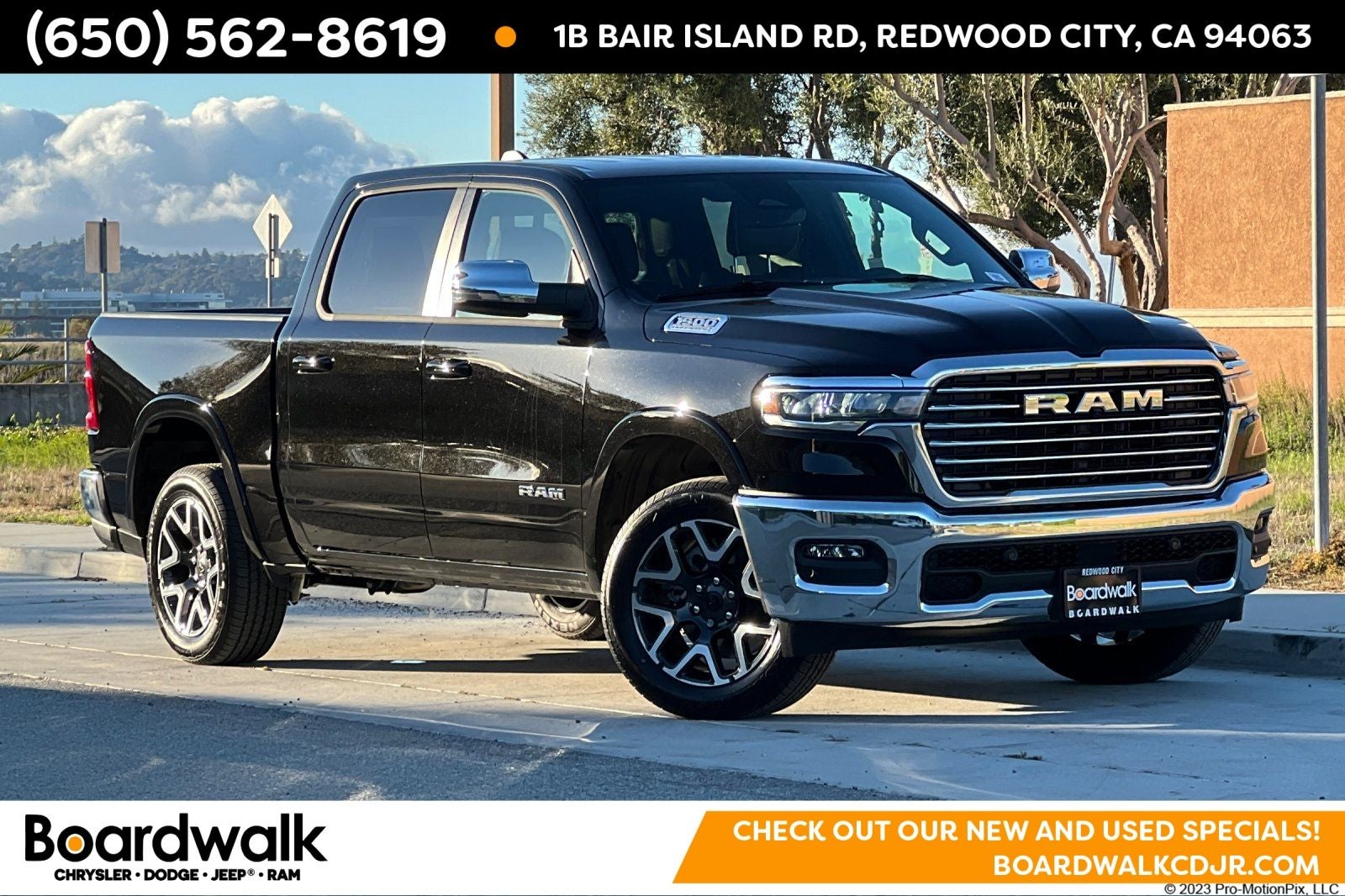 2026 RAM Ram 1500 RAM 1500 LARAMIE CREW CAB 4X4 5'7' BOX in Diamond Black Crystal Pearl-Coat Exterior Paint — front three-quarter view